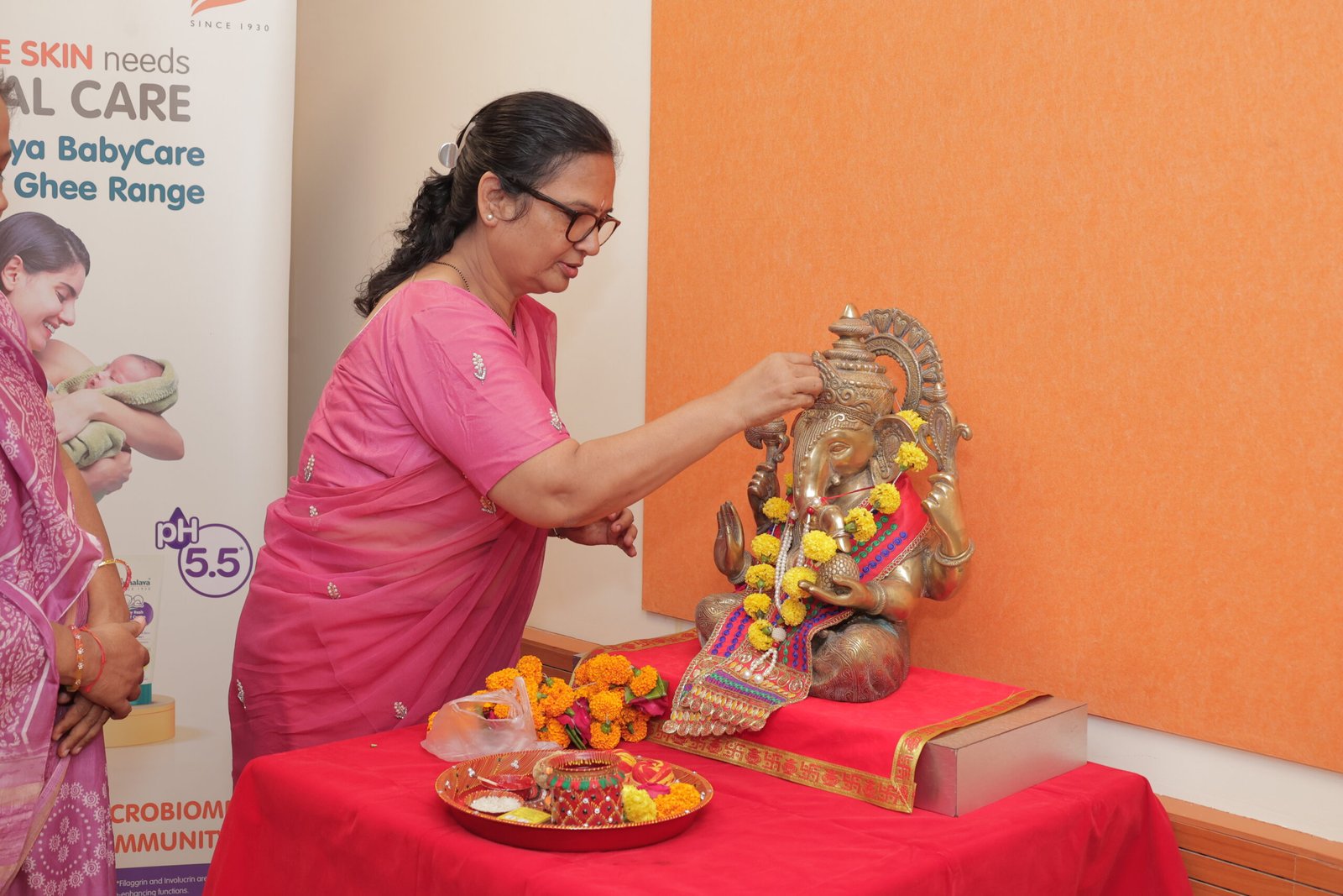 Expert doctor addressing couples at Garbh Sanskar 2025